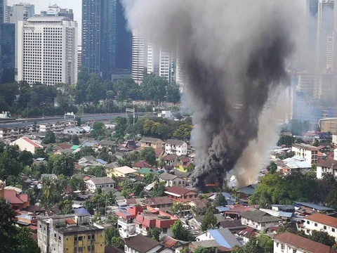 House is burning in the city Stock Footage 83868078