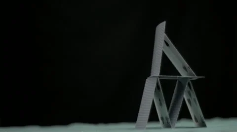House of cards falling in super slow motion Stock Footage 10859943