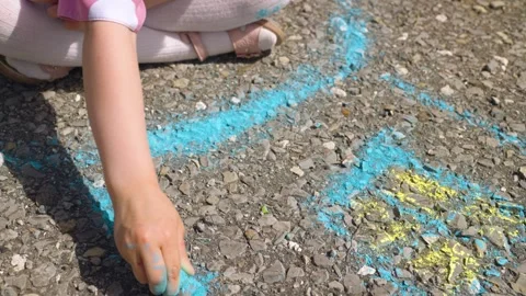 House child hand drawing chalk asphalt, child kid childhood dream, little artist Stock Footage 281460618