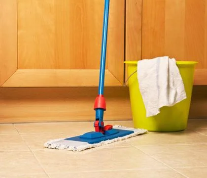 House cleaning with the mop Stock Photos