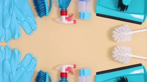 House cleaning tools make frame for text on beige background. Stop motion Видео 151551363