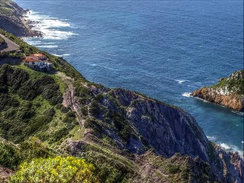 House on the cliff Photos
