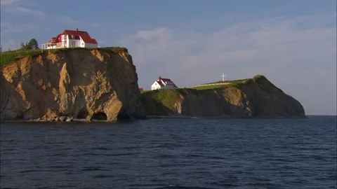 House on cliff by the sea Stock Footage 82148142
