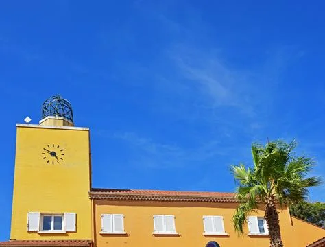 House with a clock Stock Photos