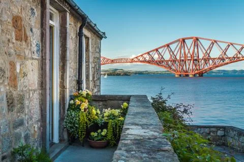 House close to the firth of forth bridge in summer Stock Photos