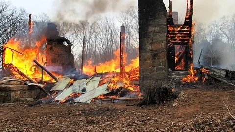 House completely destroyed by fire Stock Footage 73432563
