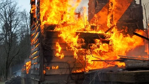 House completely destroyed by fire Stock Footage 73432671