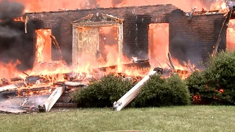 HOUSE COMPLETLEY BURNED WITH ZOOM Video stock 93402660