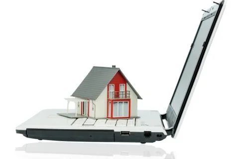 House on computer keyboard Stock Photos