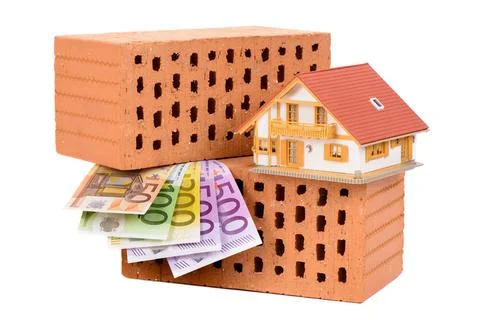 House construction with brick, tools, plan and model house house construct... Stock Photos