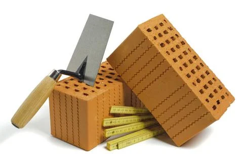 House construction with brick, tools, plan and model house house construct... Stock Photos
