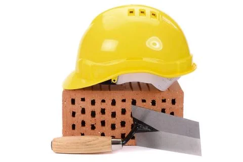 House construction with brick, tools, plan and model house house construct... Stock Photos
