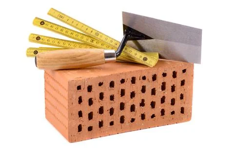 House construction with brick, tools, plan and model house house construct... Stock Photos
