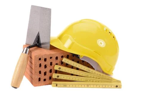 House construction with brick, tools, plan and model house house construct... Stock Photos