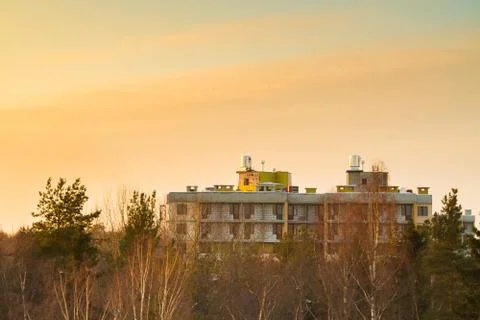 House in construction at the final stage at sunset Stock Photos
