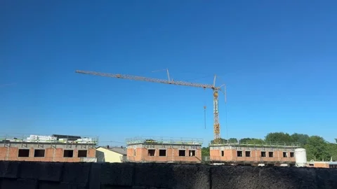 House construction shells and crane Stock Footage 313348651