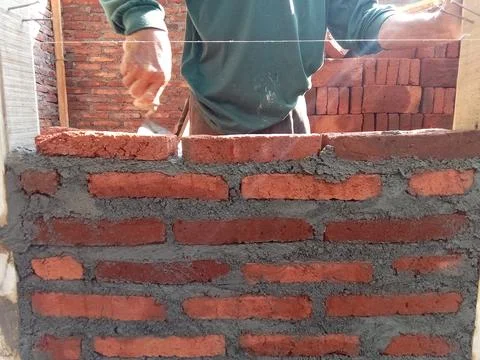 House construction using bricks, architectural theme. Photos