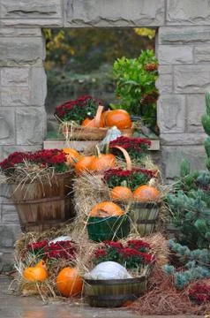 House decorated with pumpkins and fall leaves for Thanksgiving day and Hallow Stock Photos