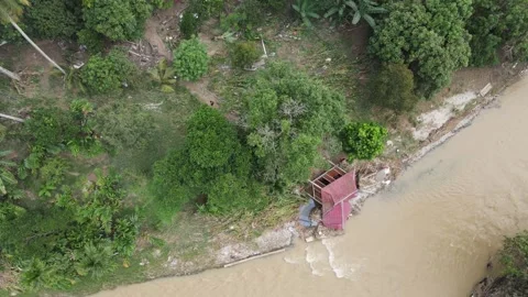 House destroy by flood from above Stock Footage 168575291