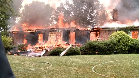 HOUSE DESTROYED BY FIRE- Stock Footage 93402597