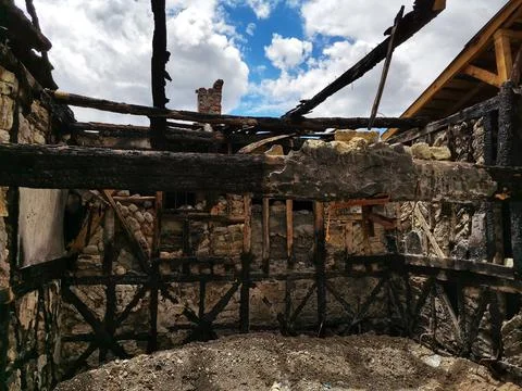 House destroyed by fire. Stock Photos