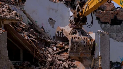 House destroyed, using a bulldozer. Stock Footage 77644255