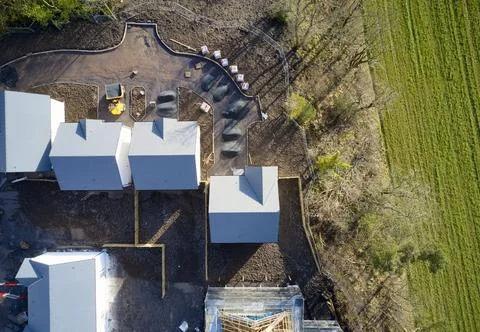 House development construction site in progress aerial view Stock Photos