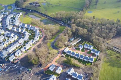 House development construction site in progress aerial view Stock Photos