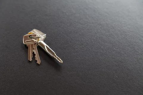House door keys on a table. Copy space. Keys concept. Stock Photos
