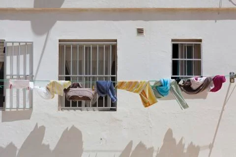 House with drying clothes Stock Photos
