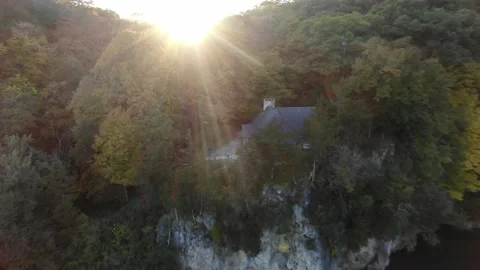 House on edge of cliff deep forest Stock Footage 141754713