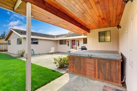 House exterior. backyard deck with jacuzzi Stock Photos