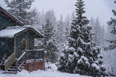 House in Falling Snow Stock Photos