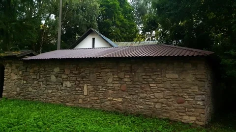 A house with a fence in a remote area. Stock-Footage 345516818