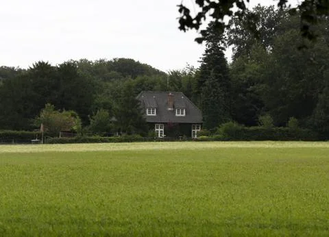 House in a field Stock Photos