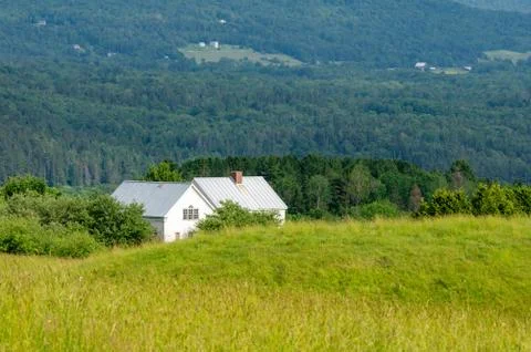 House in the Field Stock Photos