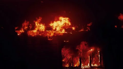 House fire. the building is on fire burning a danger smoke sparks. fire safety Stock Footage 169597230