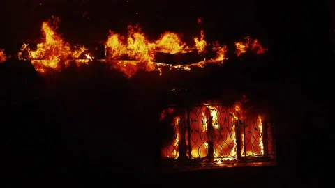 House fire. the building is on fire burning a danger smoke sparks. fire safety Stock Footage 170228066