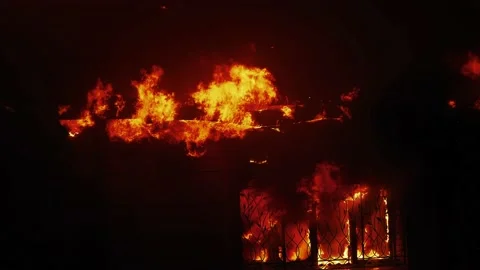 House fire. the building is on fire burning a danger smoke sparks. fire safety Stock Footage 171057816