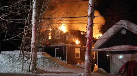 House fire causes heavy damage Stock Footage 48229387