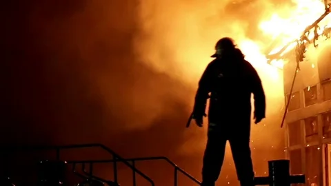 House on fire. Conflagration. Fireman fights fire. Stock Footage 69951358