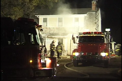 House on Fire with Emergency Vehicles Stock Footage 297731