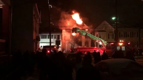 House on Fire with Firefighters Timelapse Stock Footage 129054500