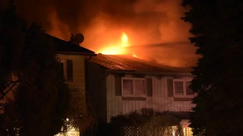 House Fire With Flames Through Roof 스톡 동영상 61805083