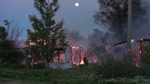 House fire full moon night P HD 9203 Stock Footage