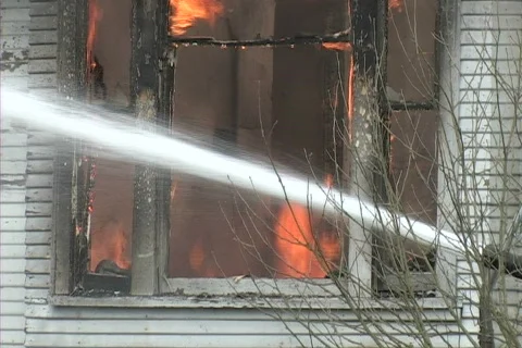 House fire with hose stream Stock-Footage 129344