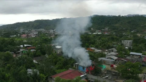 A house on fire, most of the fire has been extinguished Stock Footage 146867013