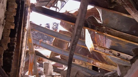 House fire, structural damage in the aftermath Ukraine War Stock Footage 263253502