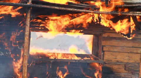 House fire in window Stock Footage 38039682