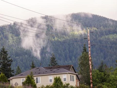 House in front of a mountain Stock Photos